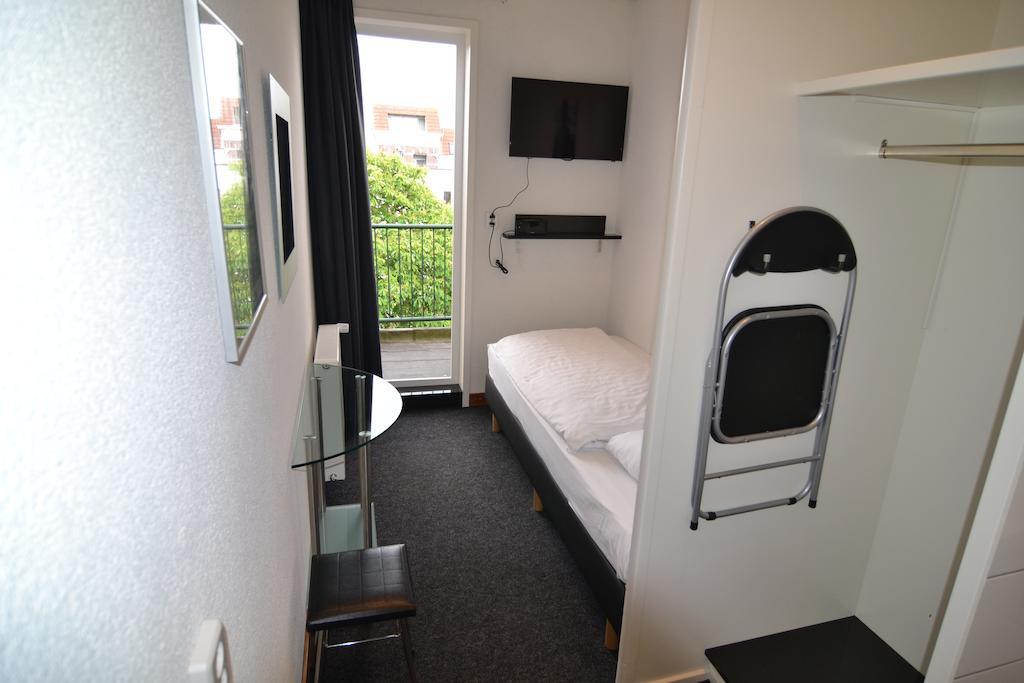 Hotel Bienvenue Rotterdam Oda fotoğraf