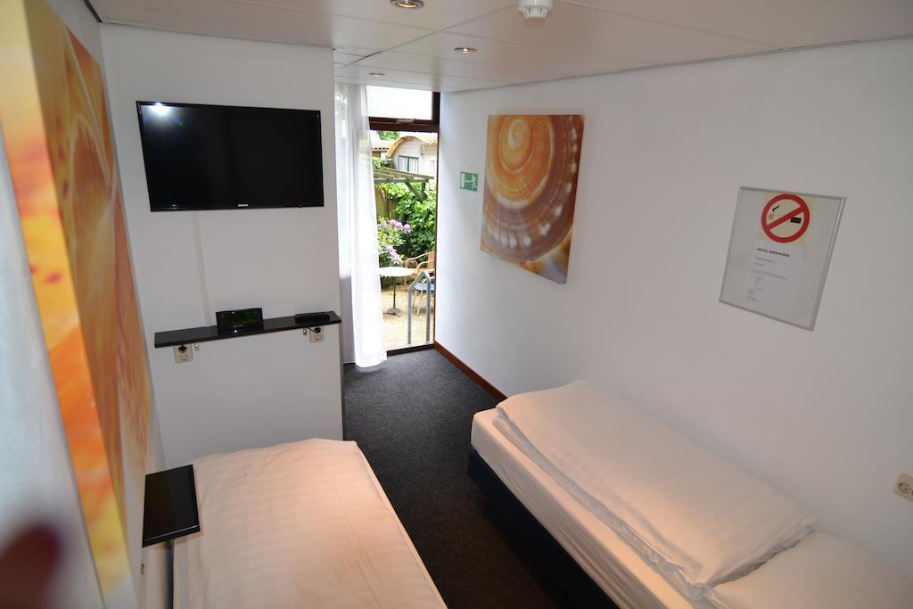 Hotel Bienvenue Rotterdam Oda fotoğraf